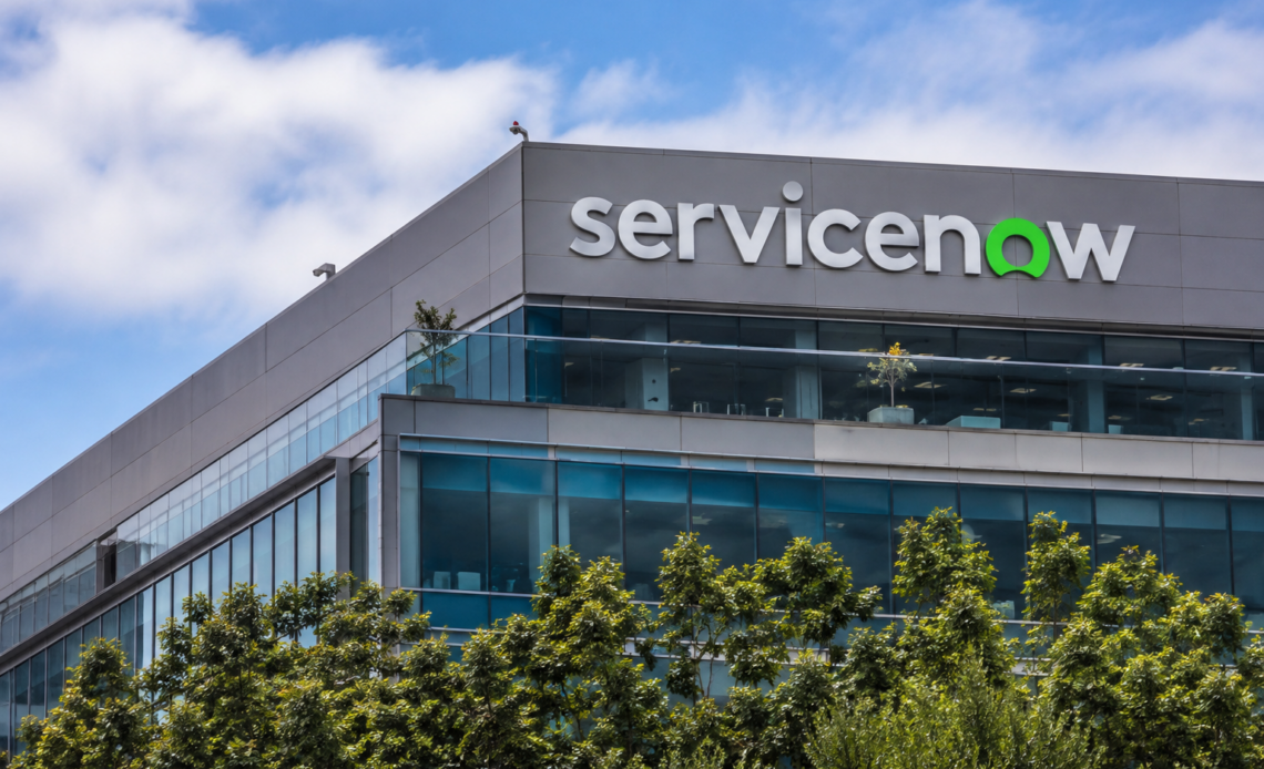 ServiceNow logo displayed on the exterior of a modern office building.