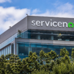 ServiceNow logo displayed on the exterior of a modern office building.