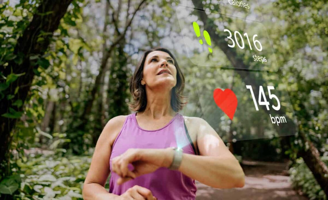 runner checks her biodata on smartwatch