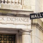 Stocks Settle Lower on Rising Bond Yields