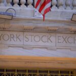 Stocks Settle Mixed as Chipmakers Climb and Financial Stocks Fall