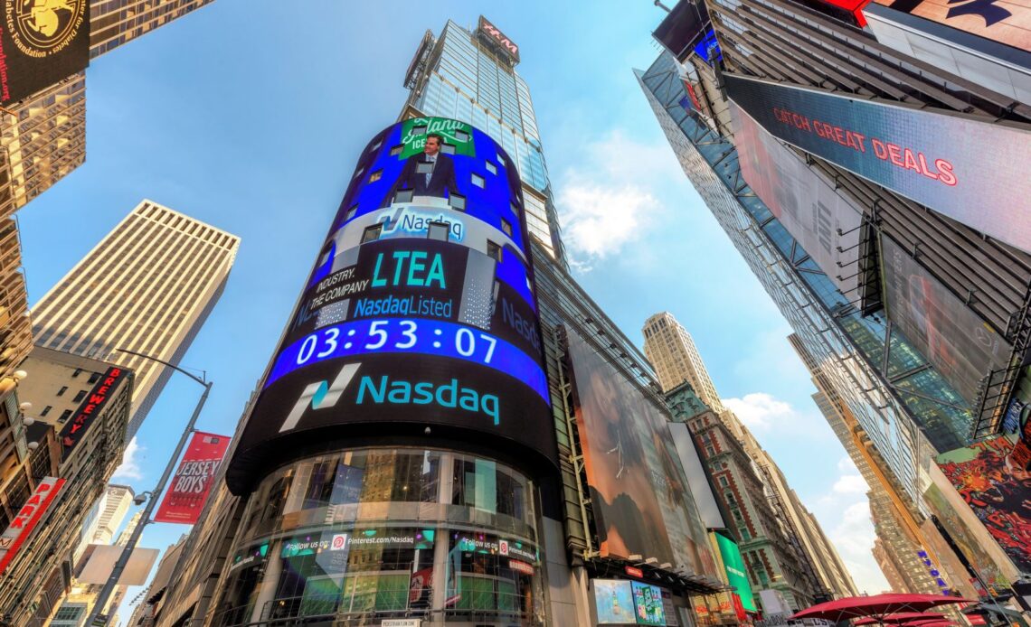 Stocks Tumble as Fed Hikes Interest Rates and Signals More to Come
