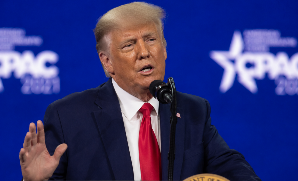 Donald Trump speaking at a conference